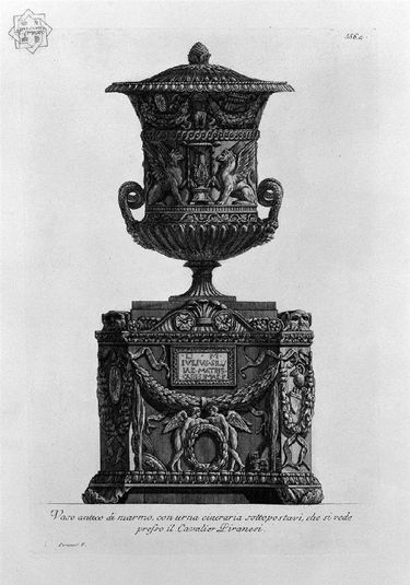 Antique vase on a marble cinerary urn